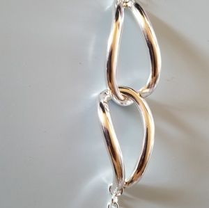 Silver tone loop bracelet